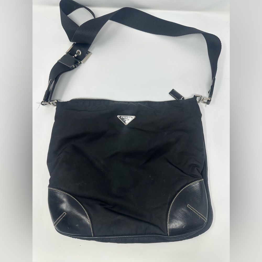 Authentic Prada nylon cross body bag.